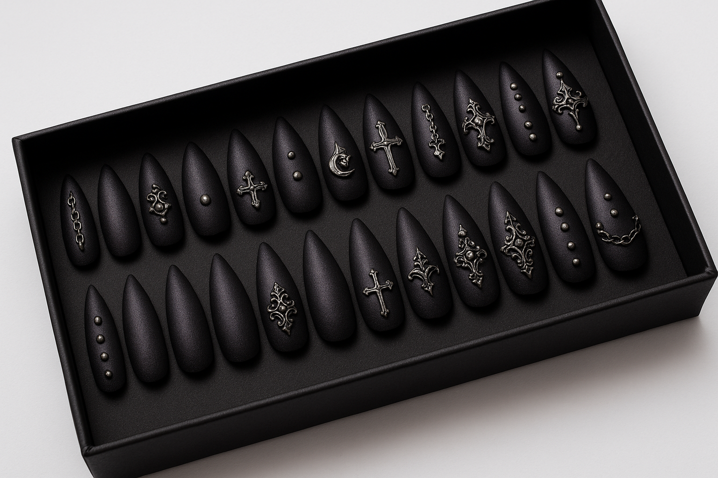 can you add silver realistic embellishment, heavy on the gothic feel but make it 2 rows of 12 nails only